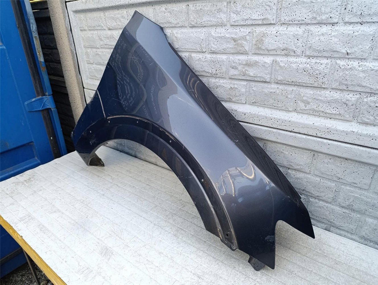 MITSUBISHI PAJERO 06-21 BŁOTNIK PRZEDNI PRAWY ORYGINAŁ (17586116479)