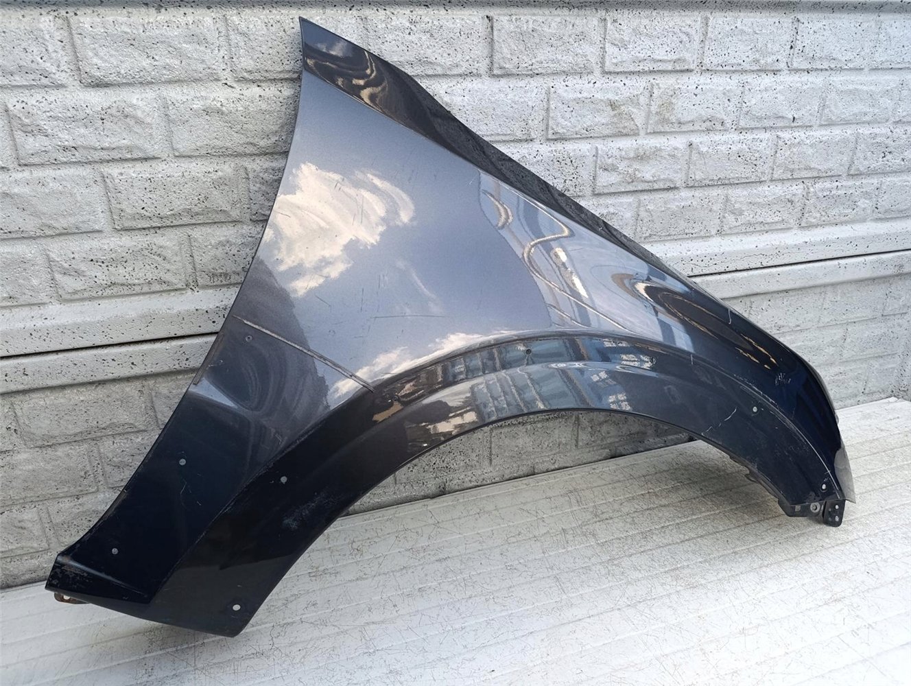 MITSUBISHI PAJERO 06-21 BŁOTNIK PRZEDNI PRAWY ORYGINAŁ (17586116479)