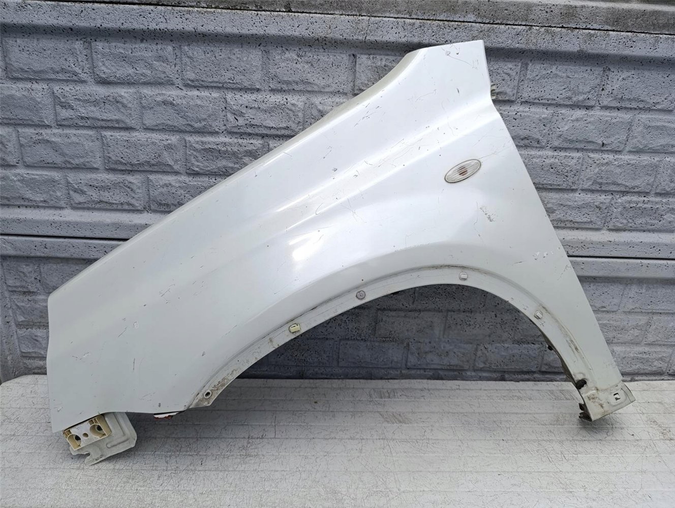 NISSAN X TRAIL T31 07-14 BŁOTNIK LEWY PRZÓD ORYGINAŁ (17594950235)