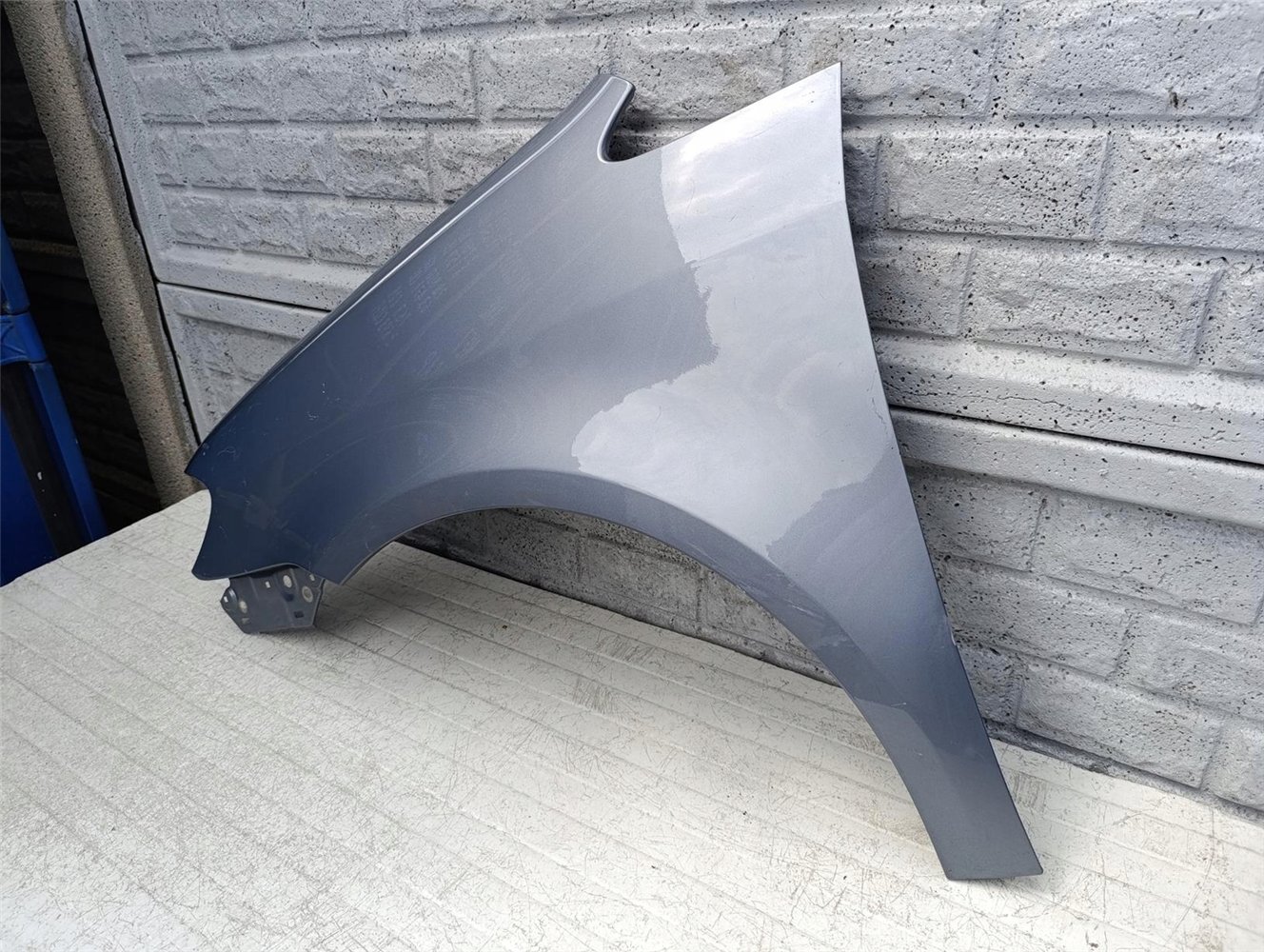 VW TOURAN LIFT BŁOTNIK LEWY 2007-2010 ORYGINAŁ (17598775853)