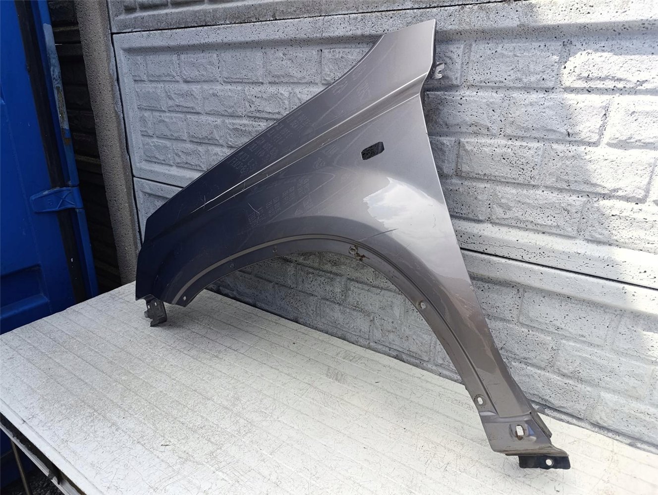 NISSAN X TRAIL T31 07-14 BŁOTNIK LEWY PRZÓD ORYGINAŁ (17602409493)