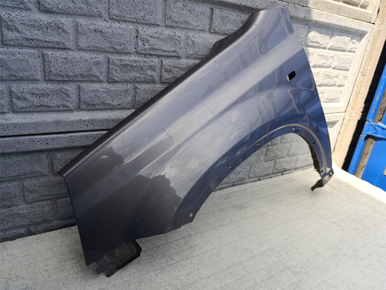 NISSAN X TRAIL T31 07-14 BŁOTNIK LEWY PRZÓD ORYGINAŁ (17602409493)