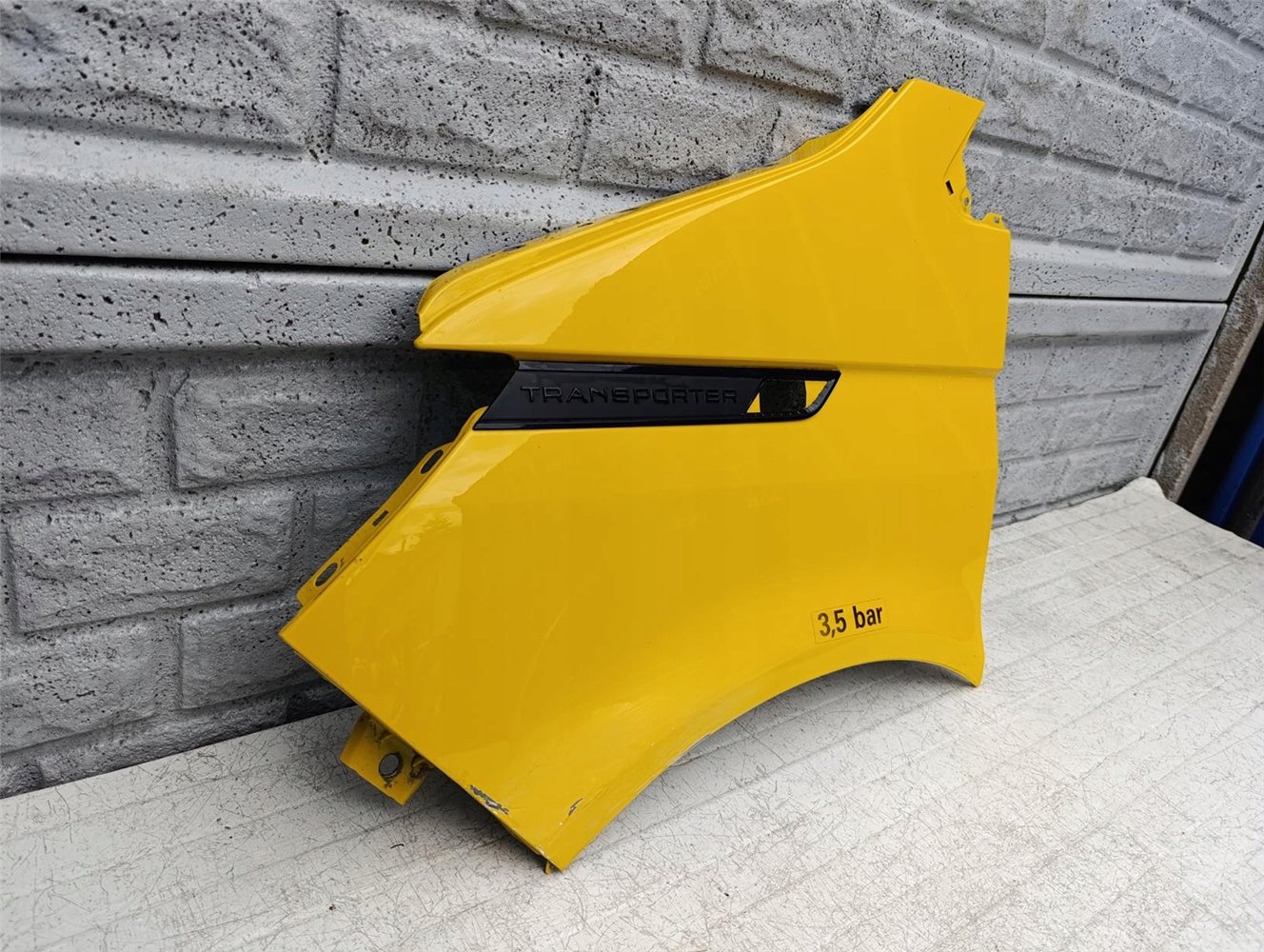 VW T6 LIFT T6.1 TRANSPORTER BŁOTNIK LEWY ORYGINAŁ (17605764336)