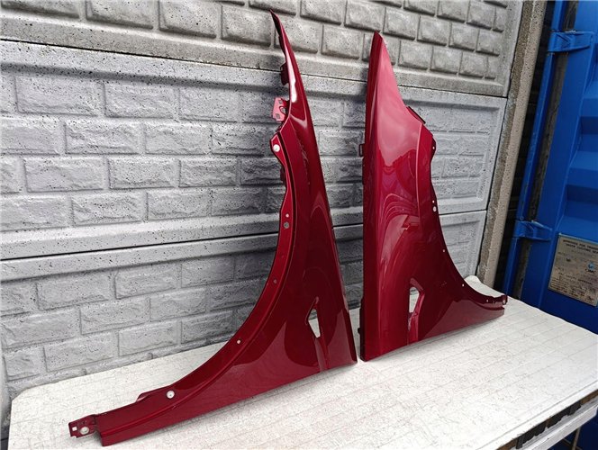 TESLA MODEL X BŁOTNIK PRAWY LEWY PRZEDNI ORYGINAŁ (17605812857)