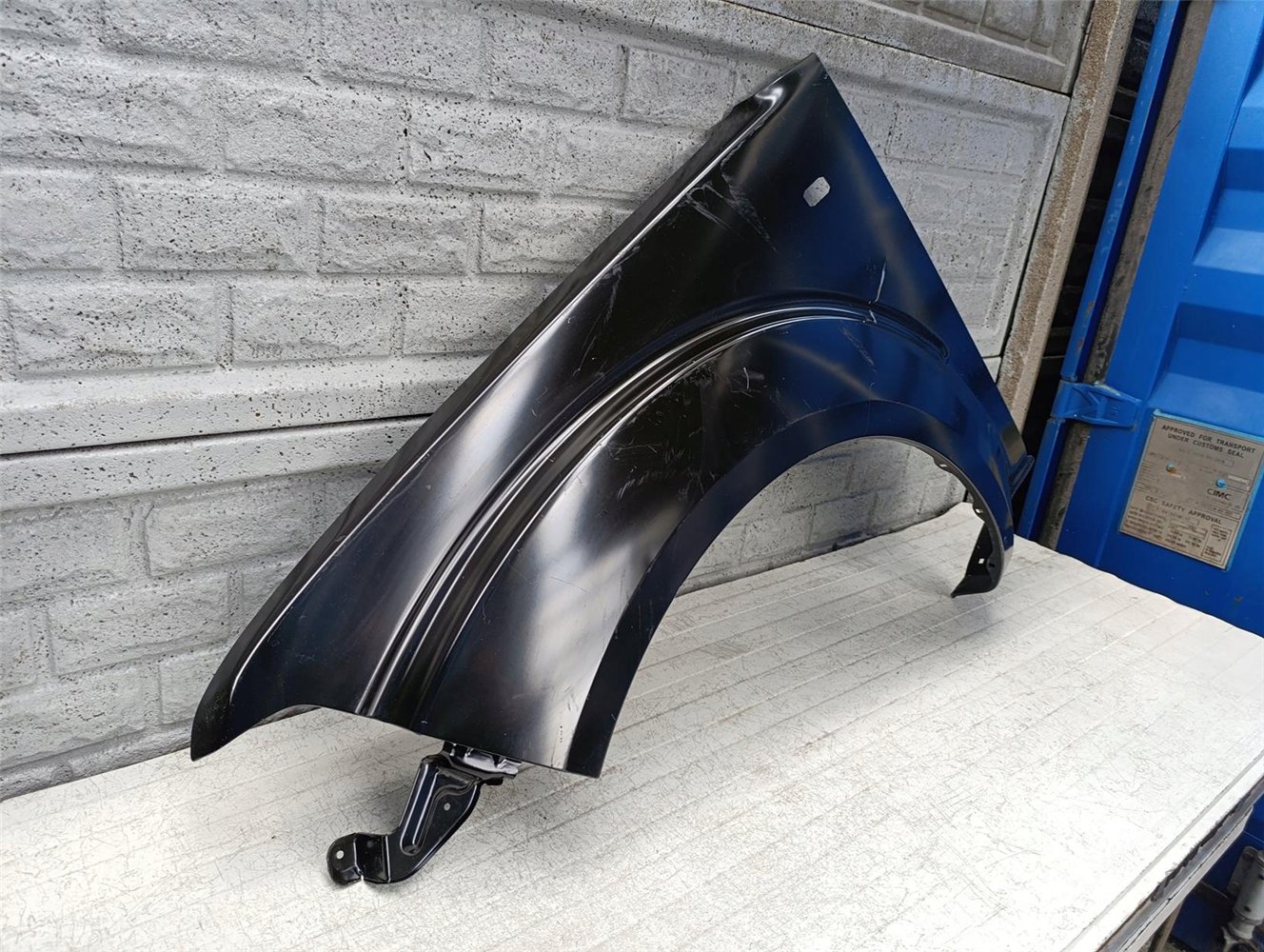 NISSAN NAVARA PATHFINDER D40 BŁOTNIK LEWY NOWY ORYGINAŁ (17618568740)