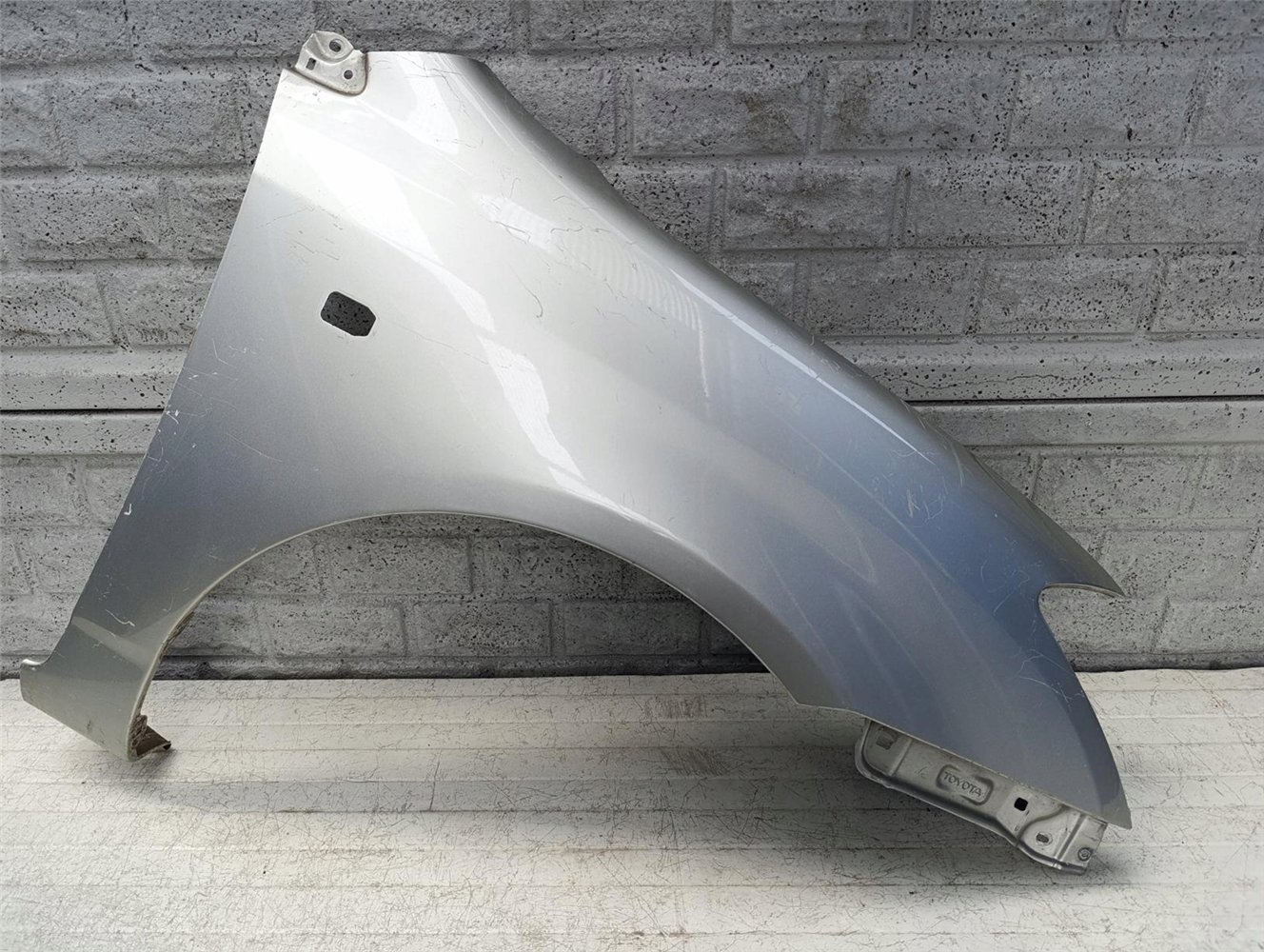 TOYOTA COROLLA E12 HB 3/5 D 02-09 BŁOTNIK PRAWY ORYGINAŁ (17619863894)