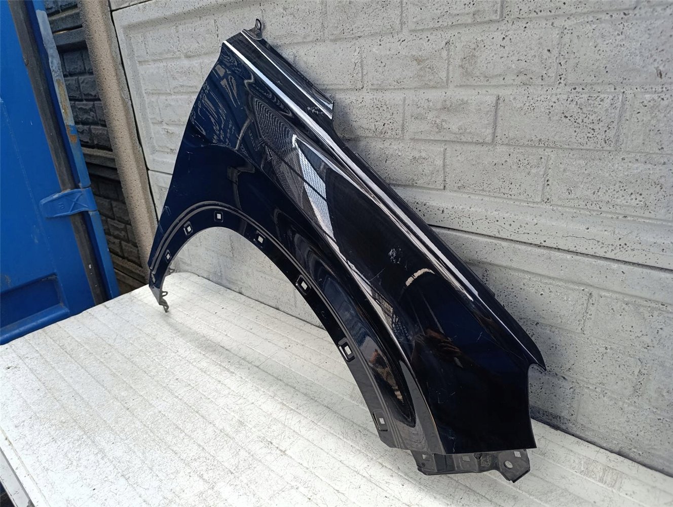 HYUNDAI SANTA FE 19-25 BŁOTNIK PRAWY PRZEDNI ORYGINAŁ (17628789134)