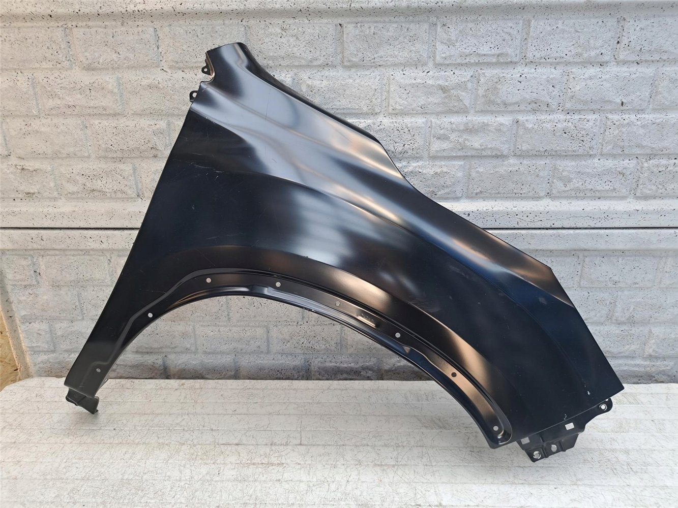 SUBARU FORESTER 24- BŁOTNIK PRZEDNI PRAWY ORYGINAŁ NOWY ORGINAŁ (17638376494)