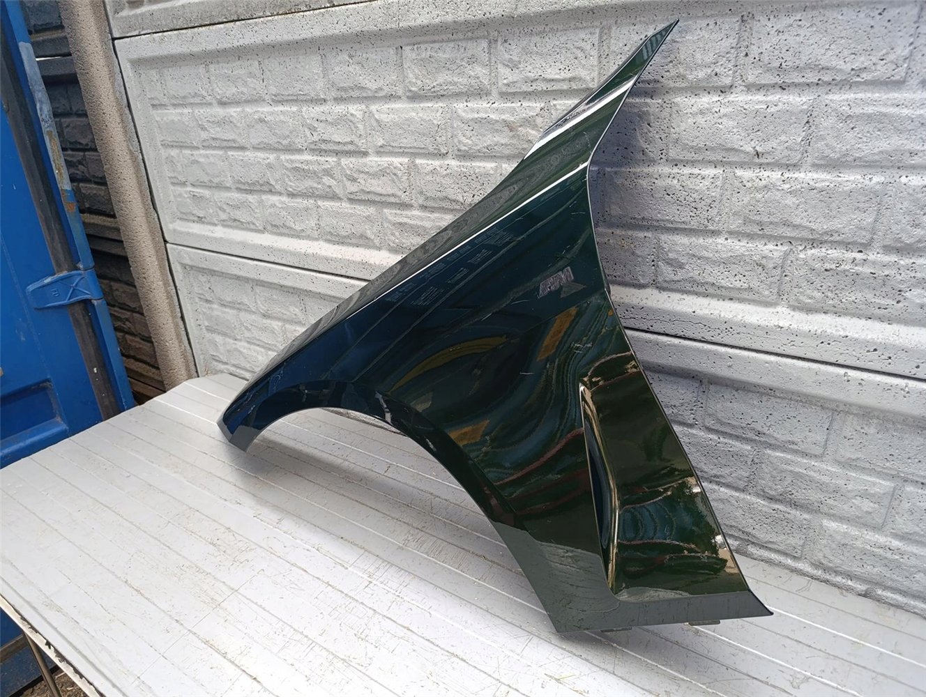 BMW IV 4 G22 G23 BŁOTNIK LEWY PRZEDNI ORYGINAŁ (17644098692)