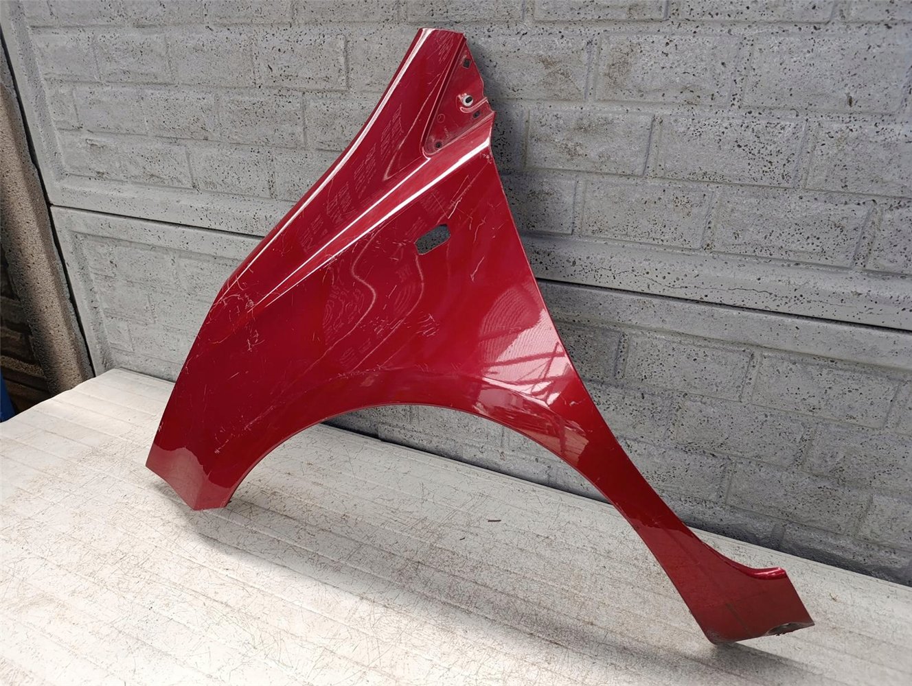 NISSAN NOTE 2006 - 2012 BŁOTNIK PRZEDNI LEWY ORYGINAŁ (17665106574)