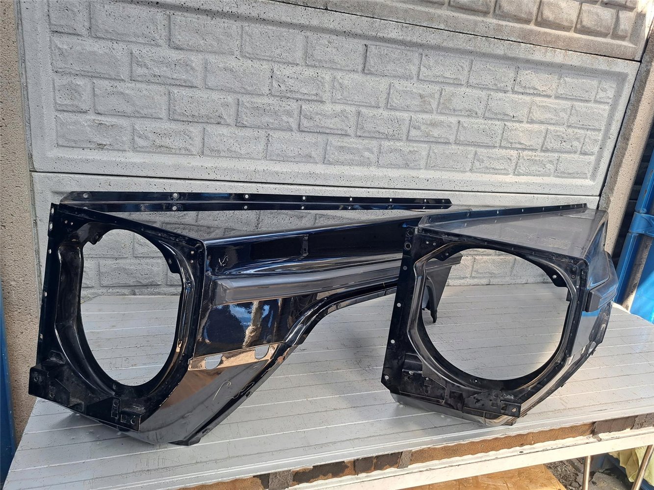 MERCEDES G-KLASA W463 BŁOTNIK PRZEDNI LEWY ORYGINAŁ (17665212233)