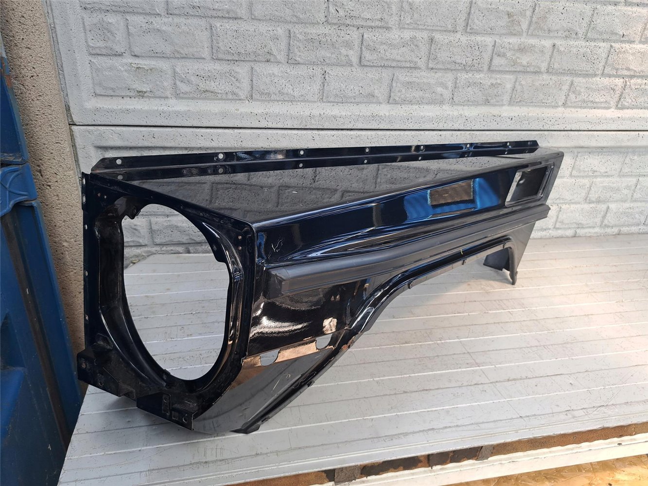 MERCEDES G-KLASA W463 BŁOTNIK PRZEDNI LEWY ORYGINAŁ (17665212233)