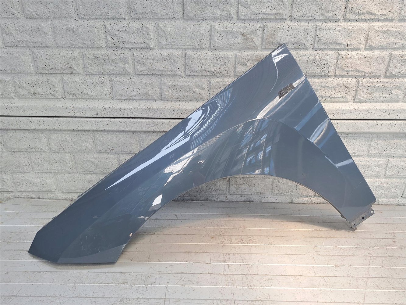 BMW iX i-X BŁOTNIK LEWY PRZEDNI ORYGINAŁ (17665221722)