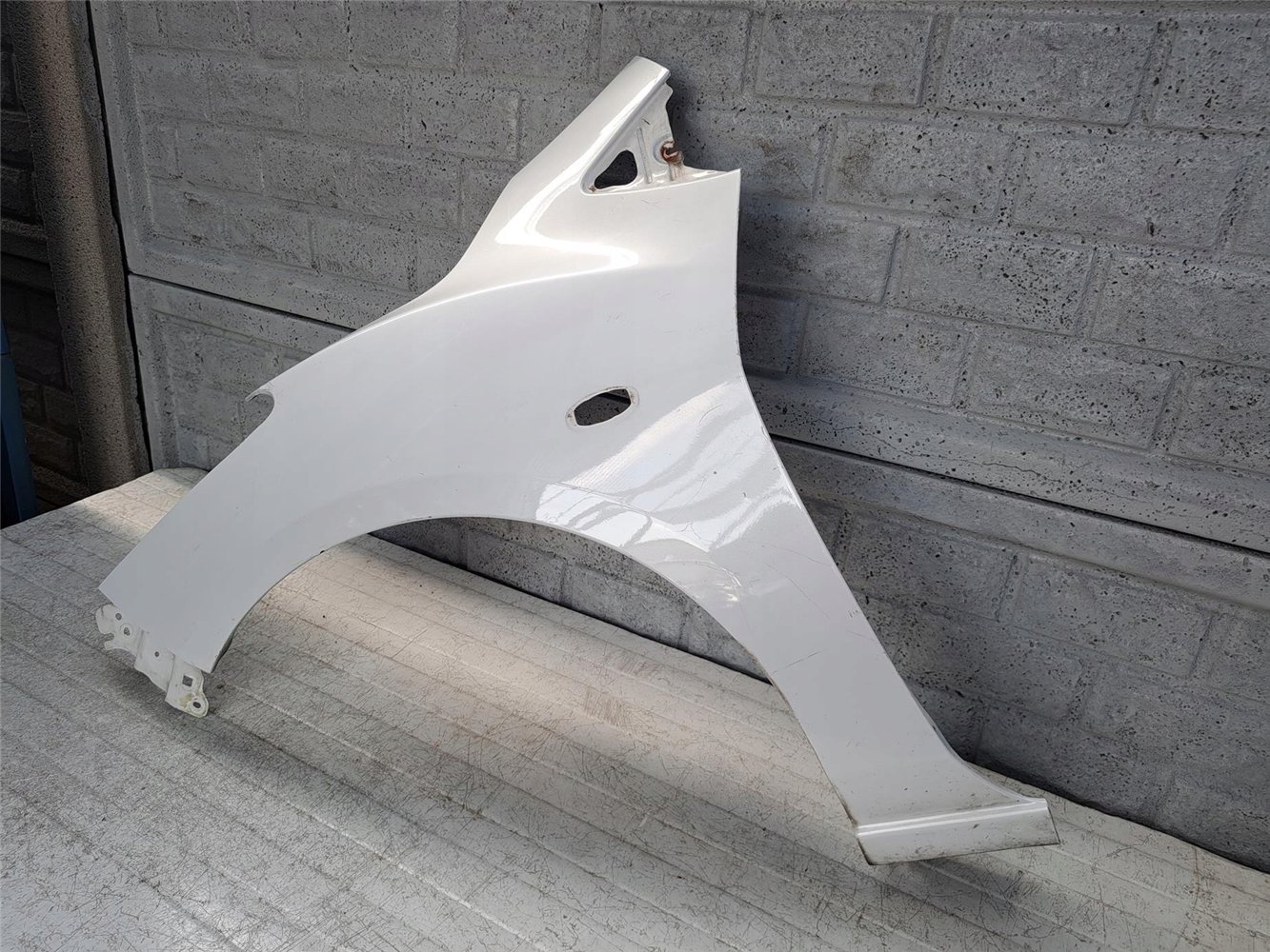 BŁOTNIK PRZEDNI LEWY MAZDA 2 II 2007-14 ORYGINAŁ (17672083768)