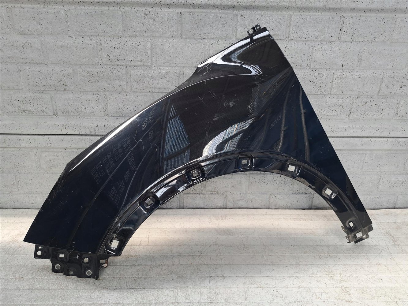 SSANGYONG TIVOLI 2015-19 BŁOTNIK LEWY PRZEDNI ORYGINAŁ (17672095506)