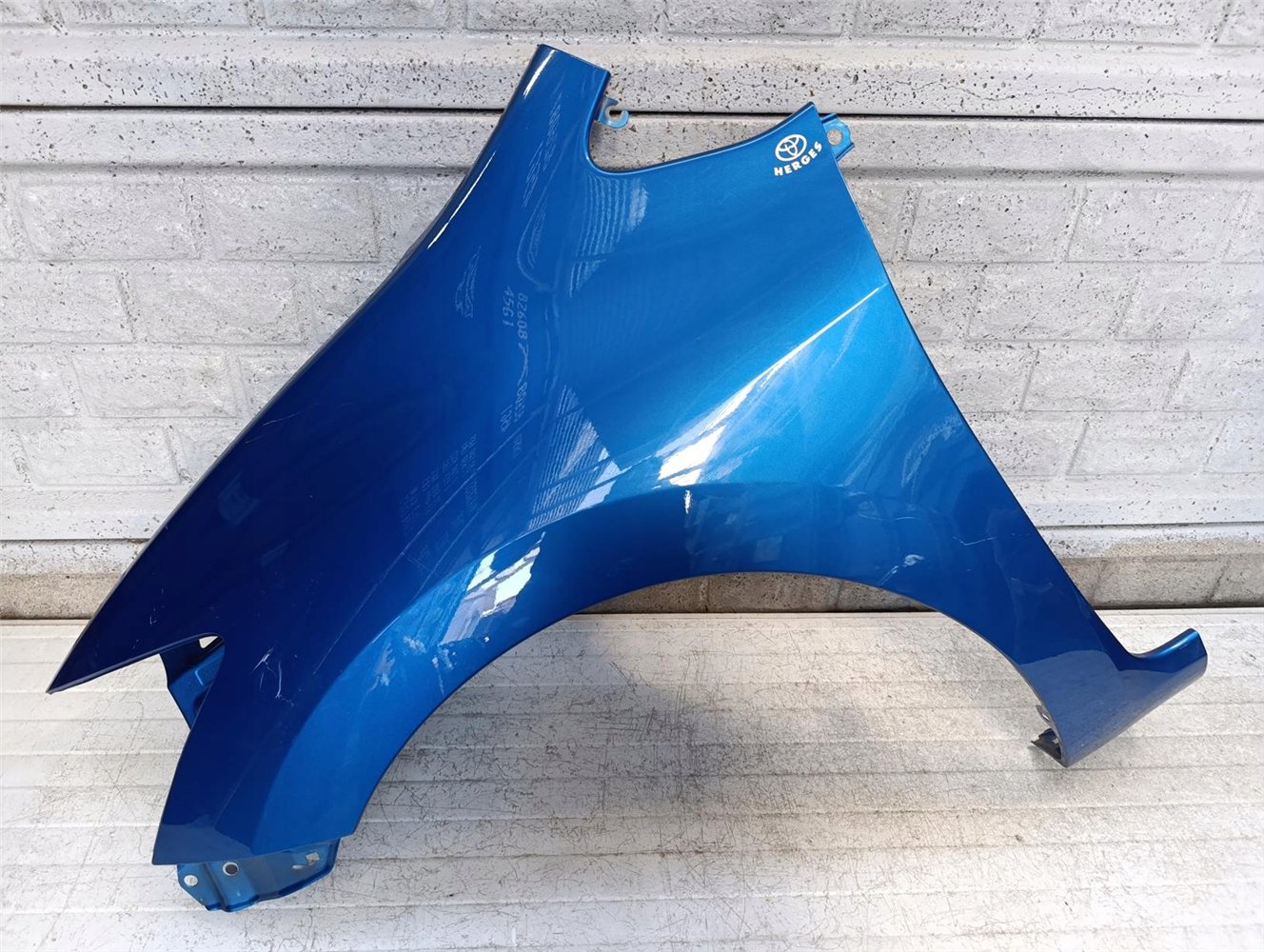 TOYOTA AURIS 1 I LIFT BŁOTNIK PRZEDNI LEWY (17681726133)