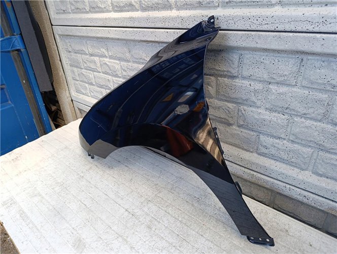 SUZUKI BALENO II 15-22 BŁOTNIK LEWY PRZEDNI ORYGINAŁ (17681859017)