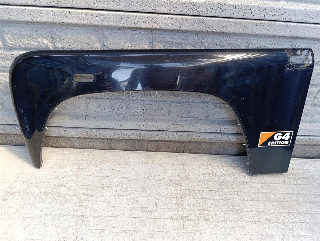 LAND ROVER DEFENDER 1 83- BŁOTNIK LEWY PRZEDNI ORYGINAŁ (17681867320)