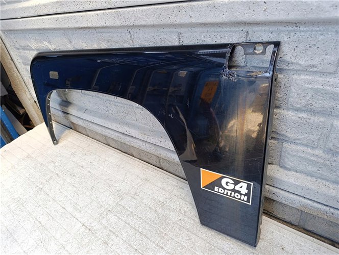 LAND ROVER DEFENDER 1 83- BŁOTNIK LEWY PRZEDNI ORYGINAŁ (17681867320)