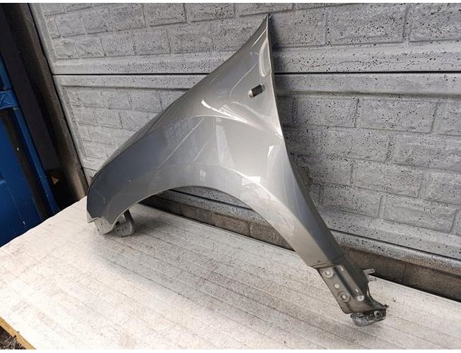 DACIA DUSTER I 1 BŁOTNIK LEWY PRZEDNI NOWY ORYGINAŁ (17690663006)