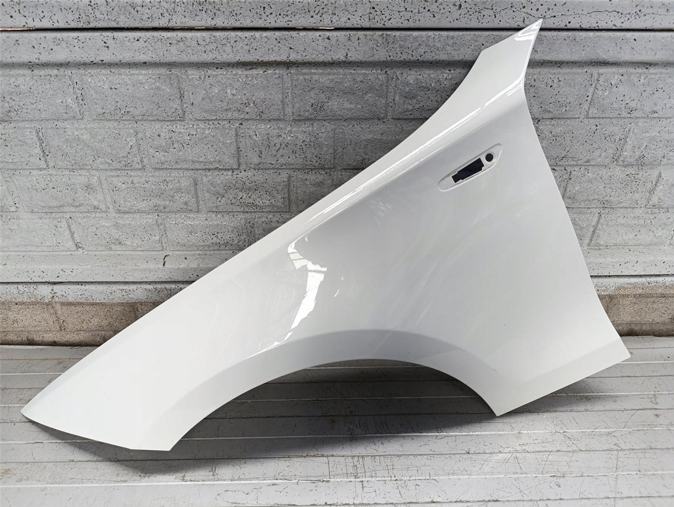 BMW 1 E87 E88 E81 E82 2004 - 2011 BŁOTNIK LEWY ORYGINAŁ (17697470566)