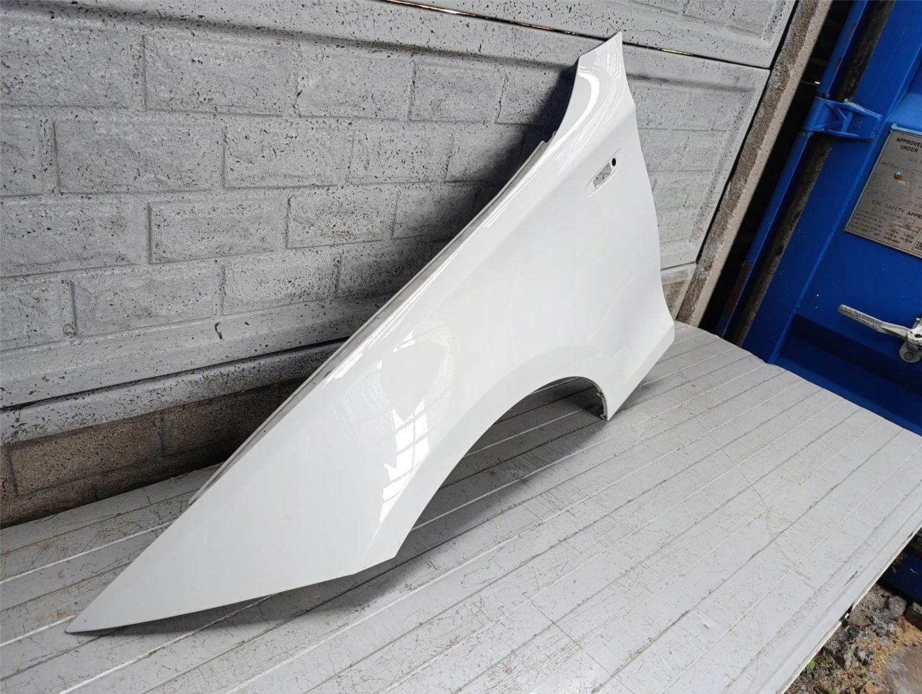 BMW 1 E87 E88 E81 E82 2004 - 2011 BŁOTNIK LEWY ORYGINAŁ (17697470566)