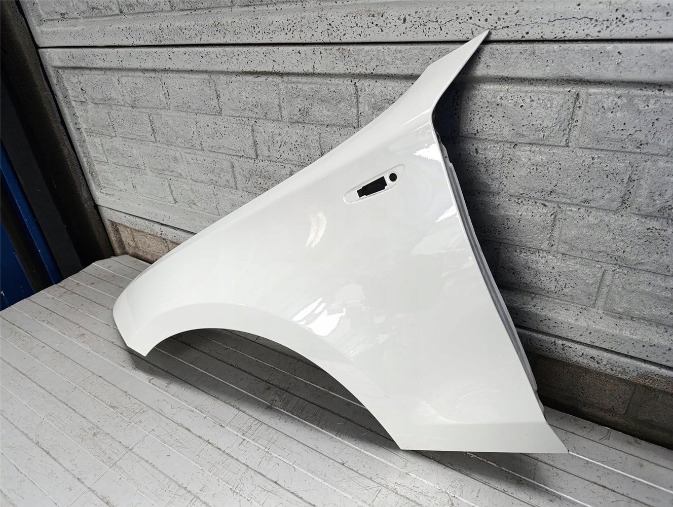 BMW 1 E87 E88 E81 E82 2004 - 2011 BŁOTNIK LEWY ORYGINAŁ (17697470566)