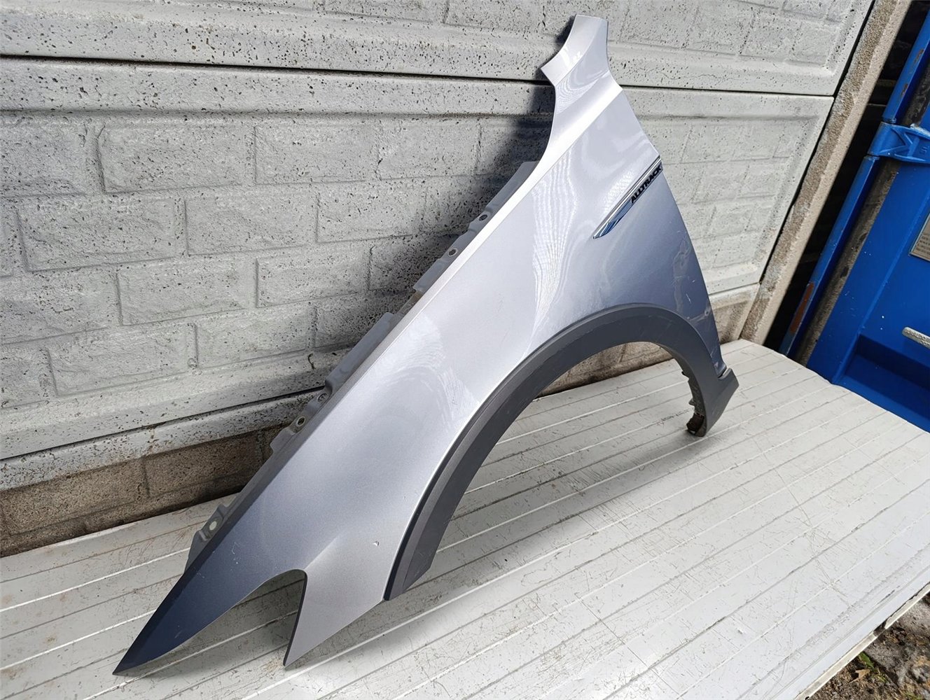 VW PASSAT B8 ALLTRACK BŁOTNIK PRZEDNI LEWY ORYGINAŁ (17702714212)