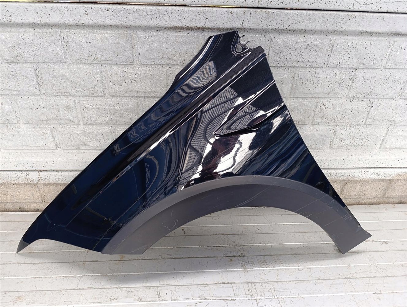 VW TAIGO BŁOTNIK LEWY PRZEDNI ORYGINAŁ (17702728530)