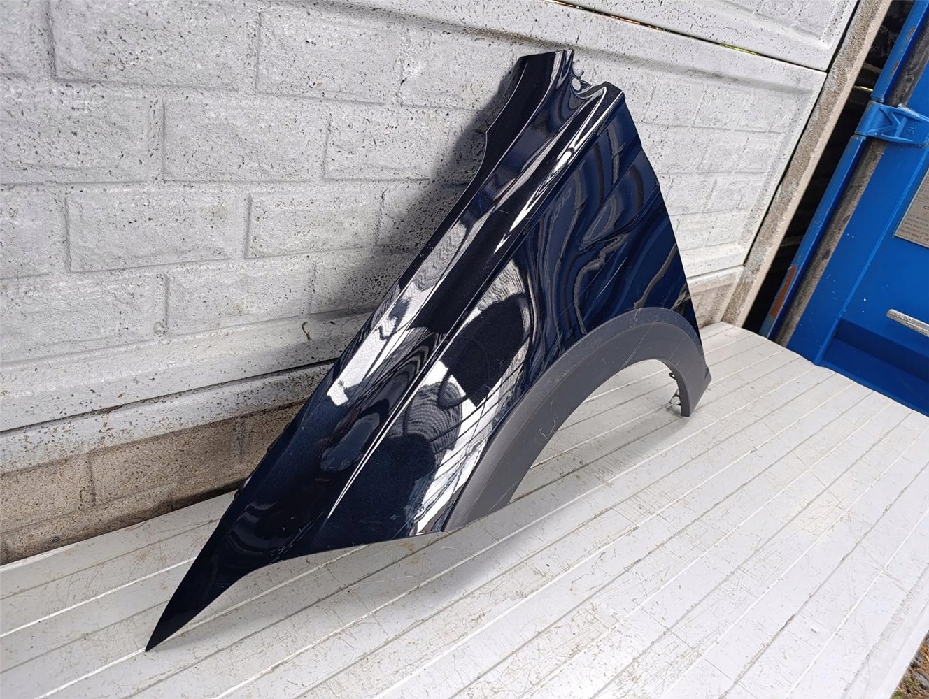 VW TAIGO BŁOTNIK LEWY PRZEDNI ORYGINAŁ (17702728530)