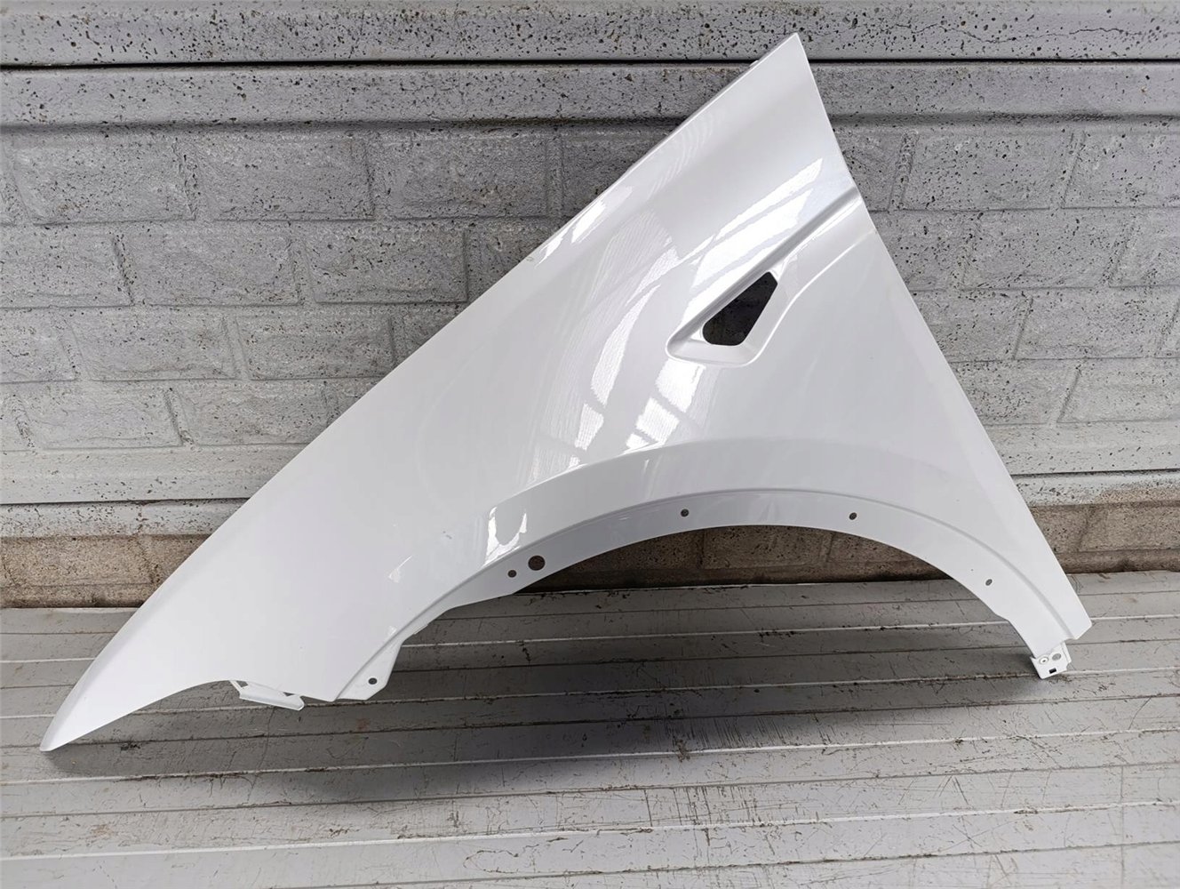 TESLA MODEL X BŁOTNIK LEWY PRZEDNI ORYGINAŁ (17713103597)