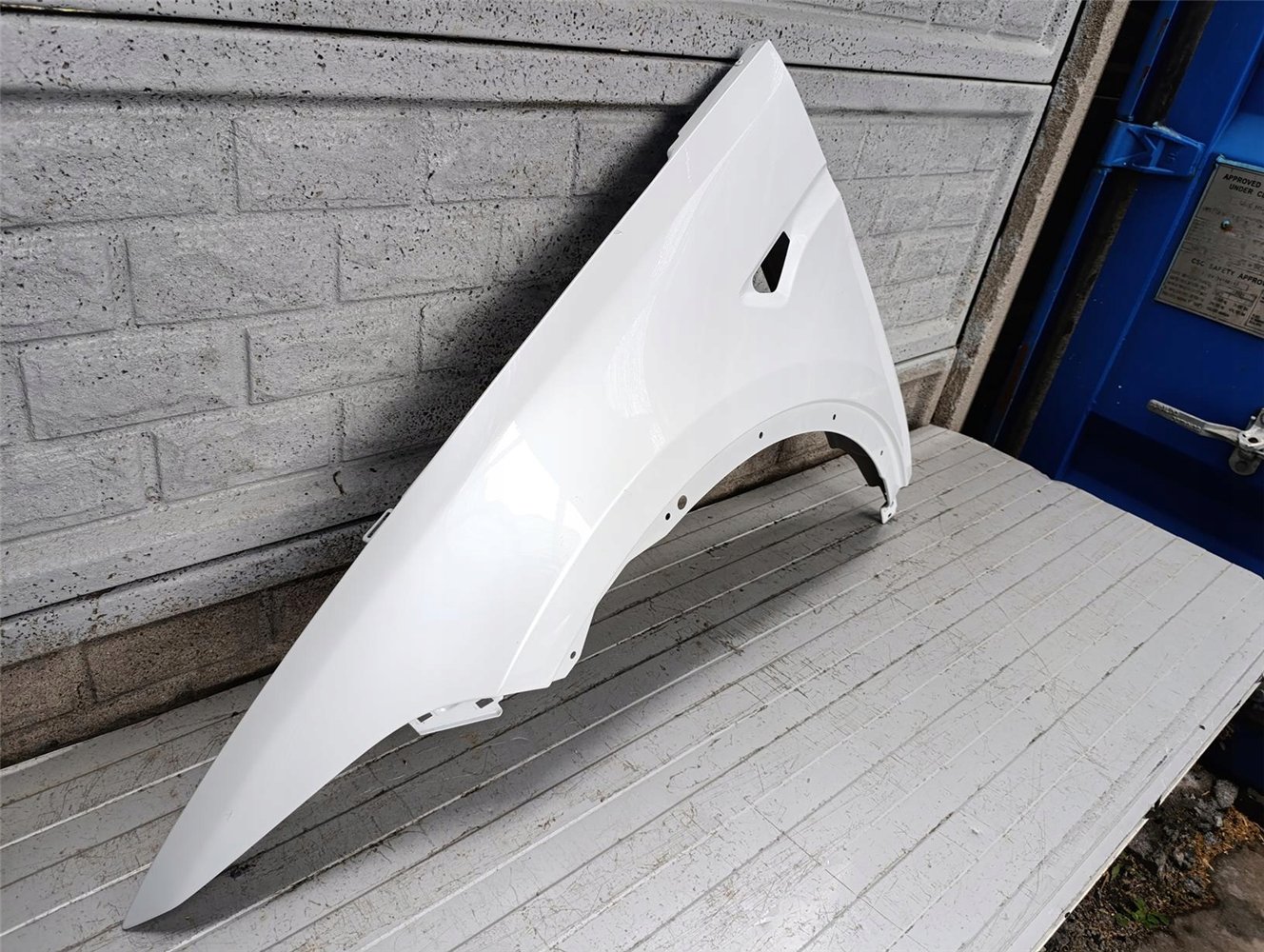 TESLA MODEL X BŁOTNIK LEWY PRZEDNI ORYGINAŁ (17713103597)