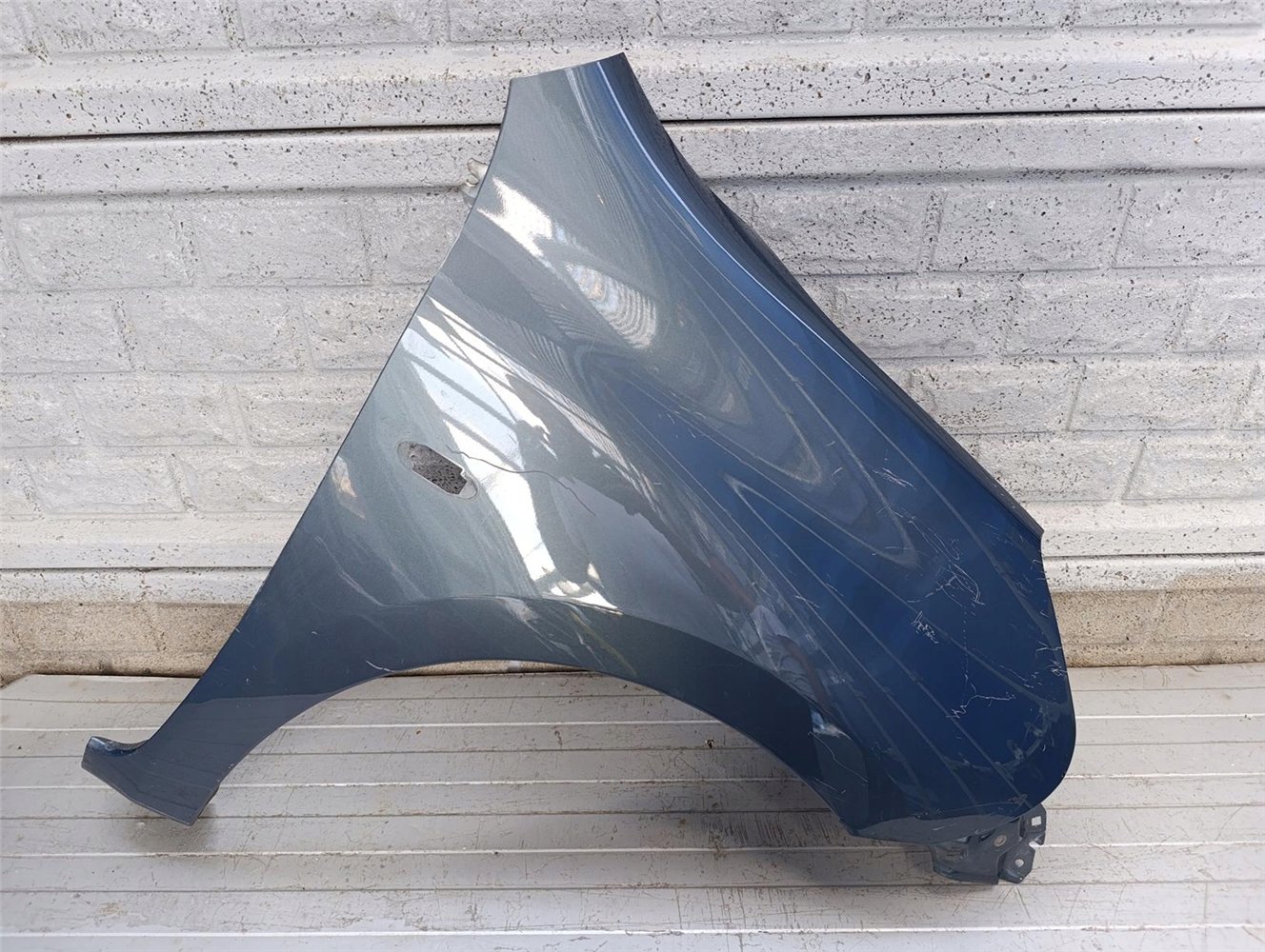 NISSAN MICRA K13 LIFT 13-18 BŁOTNIK PRZEDNI PRAWY ORYGINAŁ (17715642526)