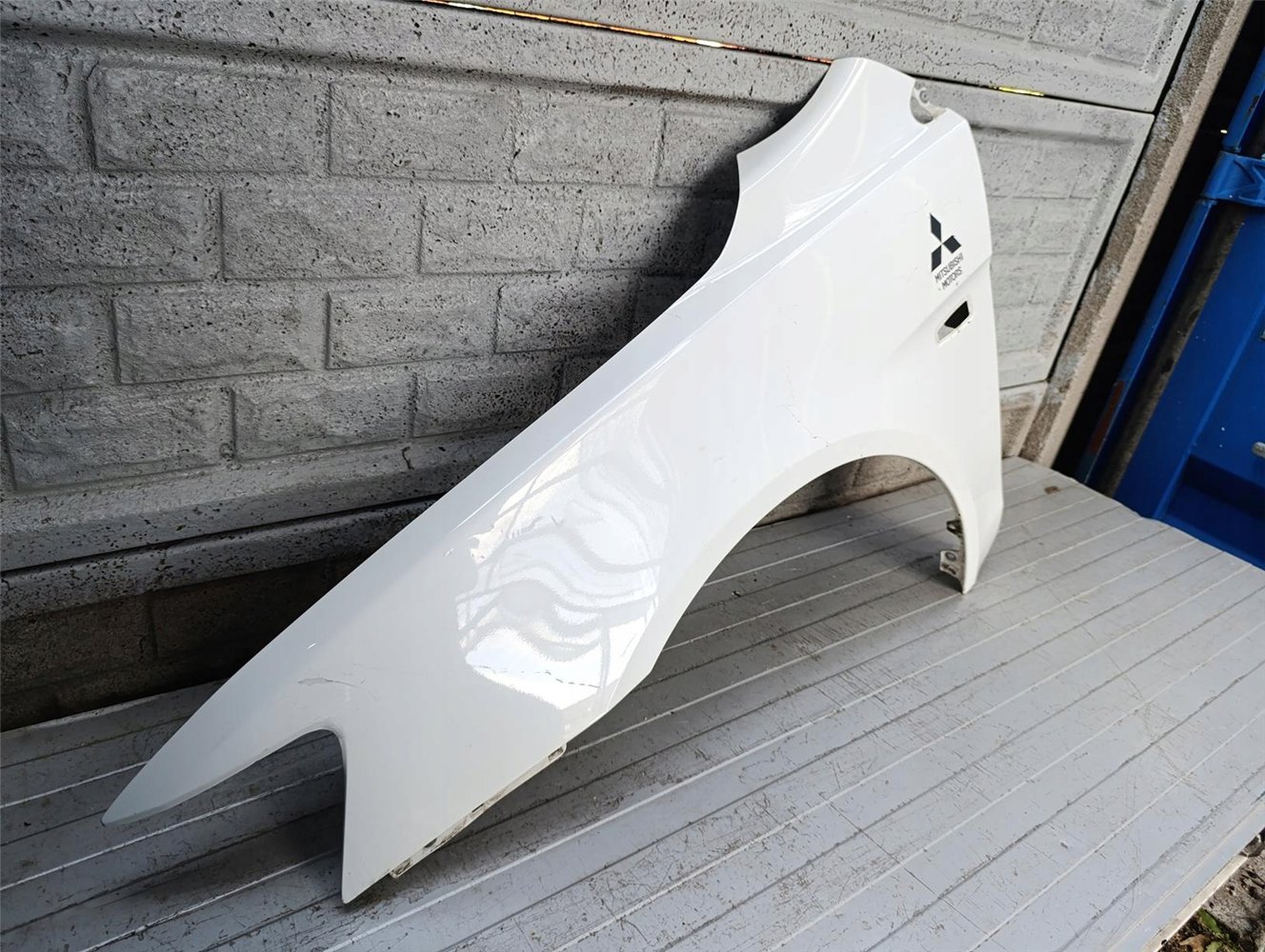 MITSUBISHI LANCER X10 08-17 BŁOTNIK PRZEDNI LEWY ORYGINAŁ (17715664837)