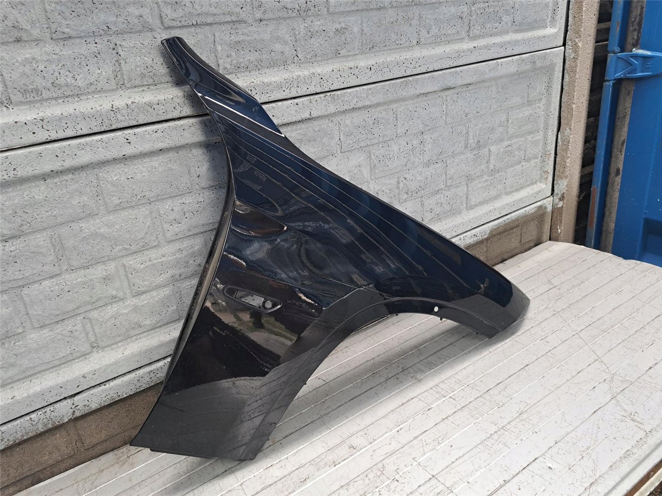 BMW X1 E84 2008-2013 BŁOTNIK PRAWY PRZEDNI ORYGINAŁ (17718174245)