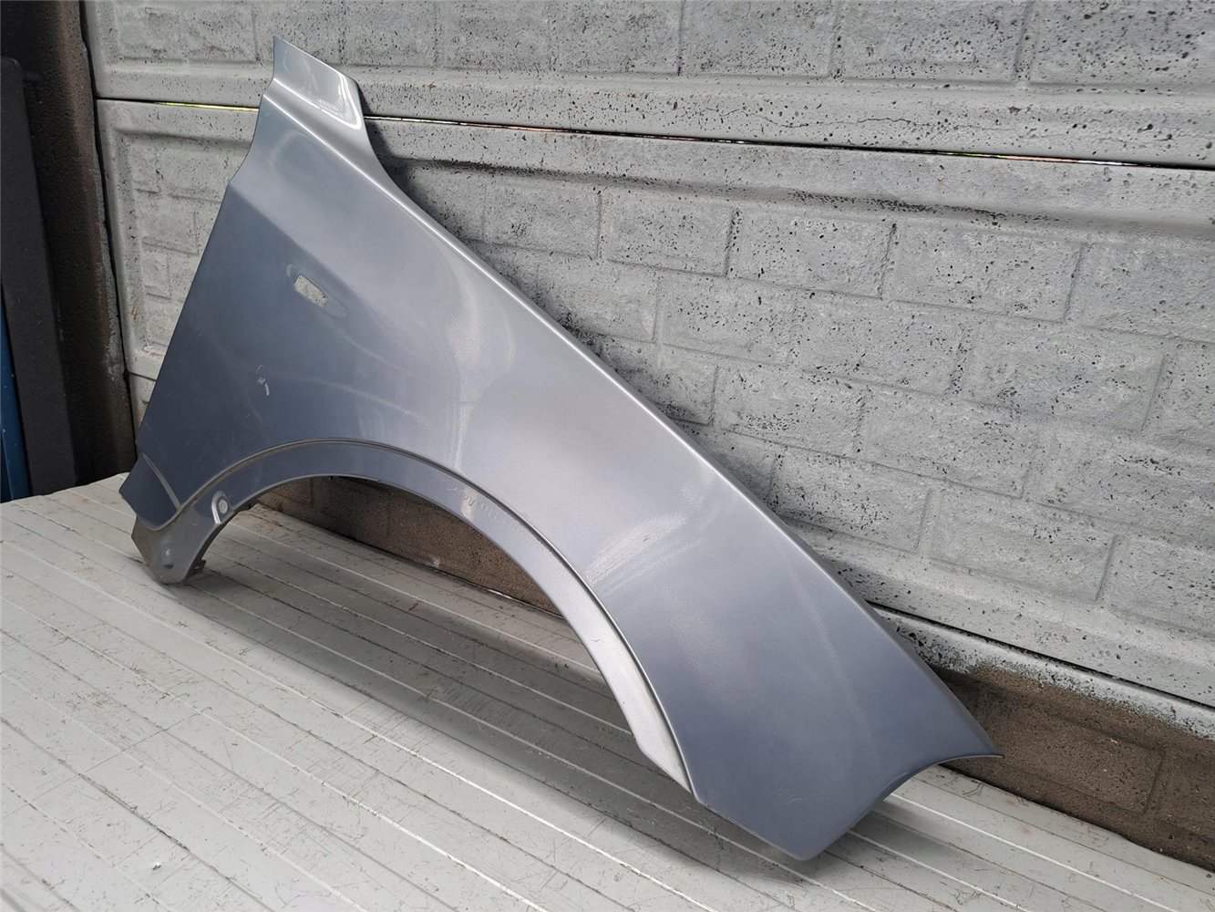 BMW X3 E83 LIFT BŁOTNIK PRAWY PRZEDNI ORYGINAŁ (17718216941)