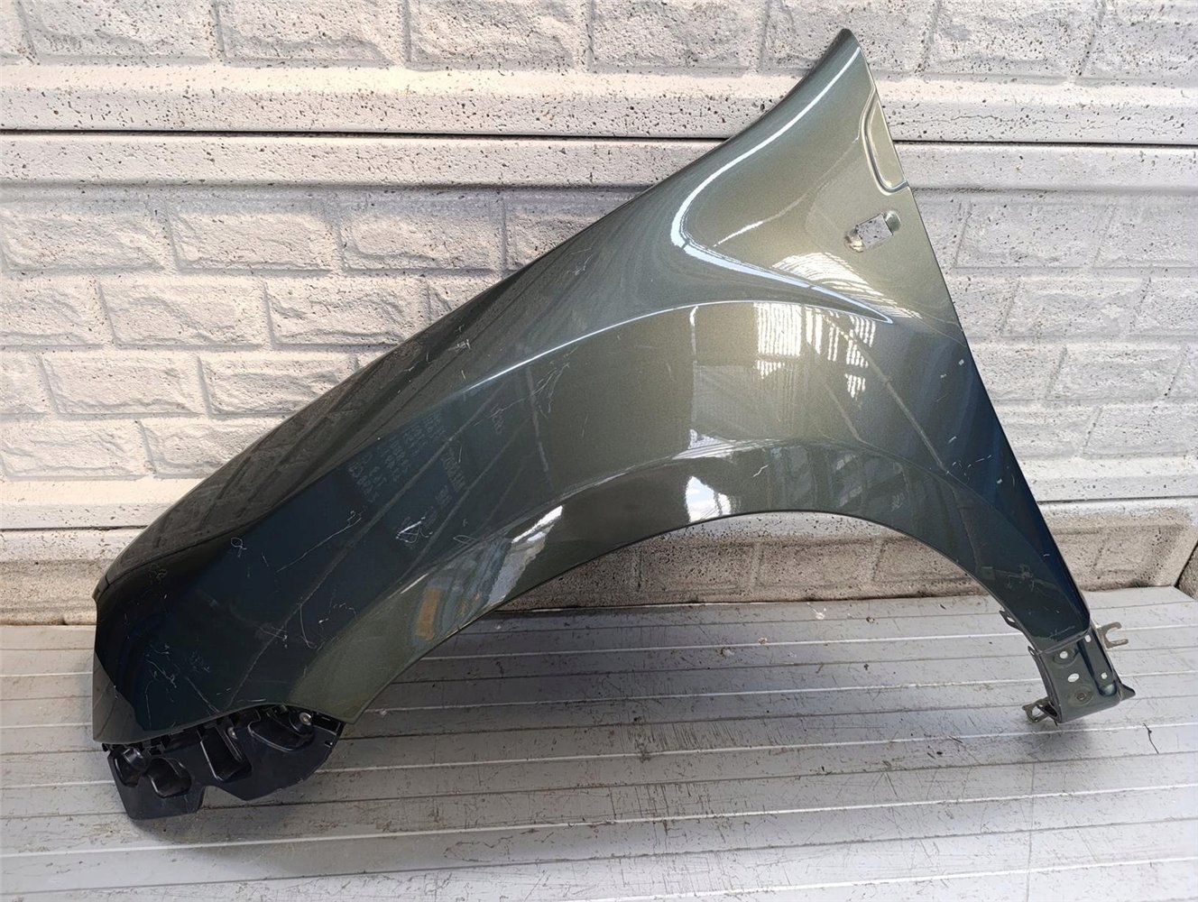 DACIA DUSTER I 1 BŁOTNIK LEWY PRZEDNI NOWY ORYGINAŁ (17736472962)