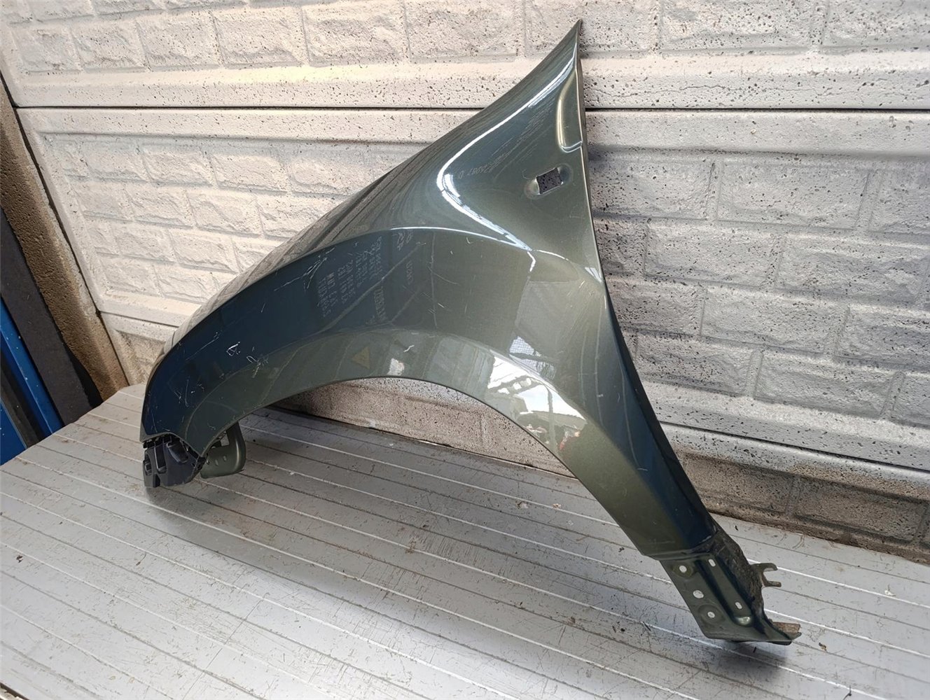 DACIA DUSTER I 1 BŁOTNIK LEWY PRZEDNI NOWY ORYGINAŁ (17736472962)