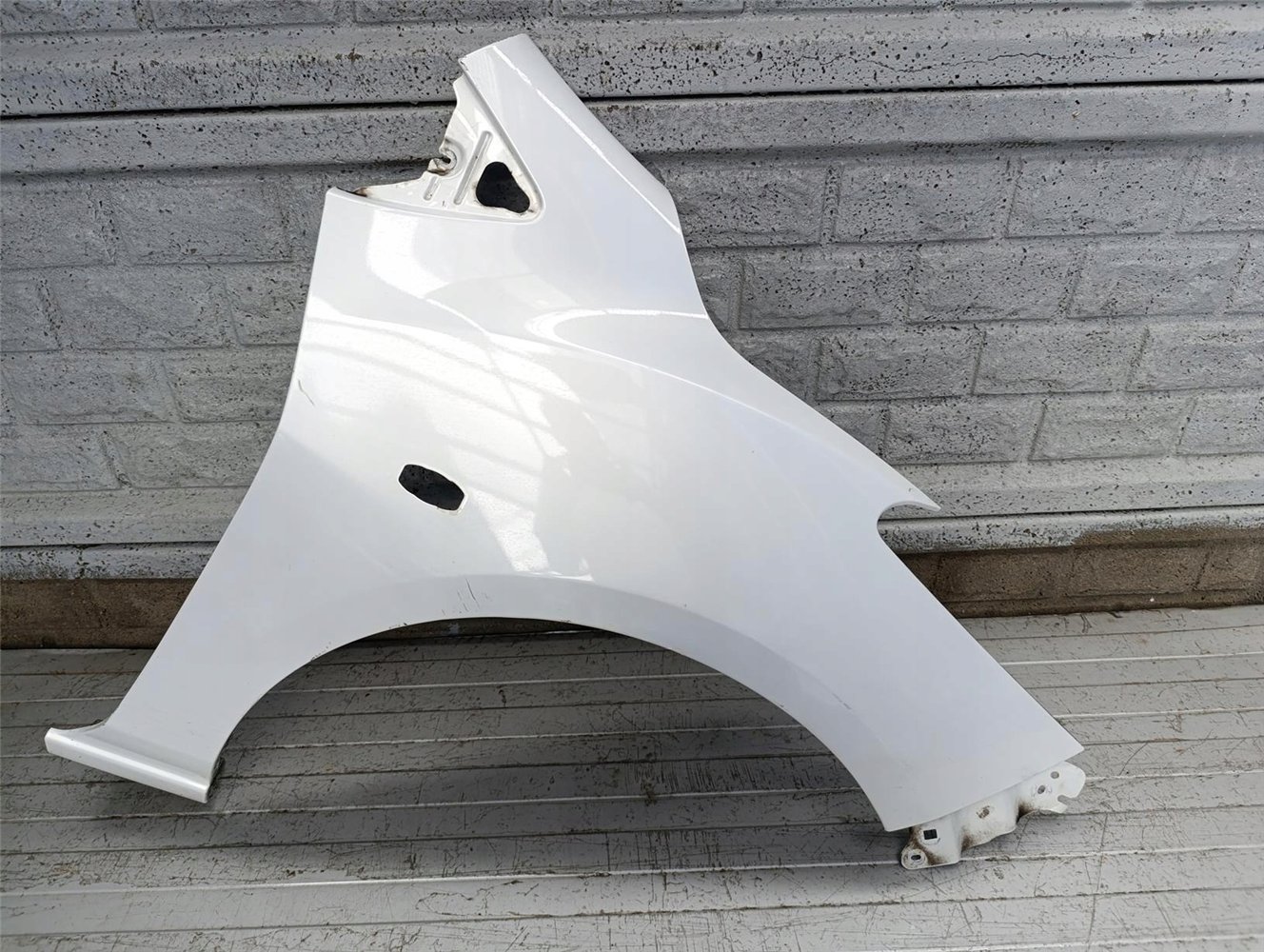 MAZDA 2 II 2007-2015 BŁOTNIK PRAWY PRZEDNI ORYGINAŁ (17752504763)