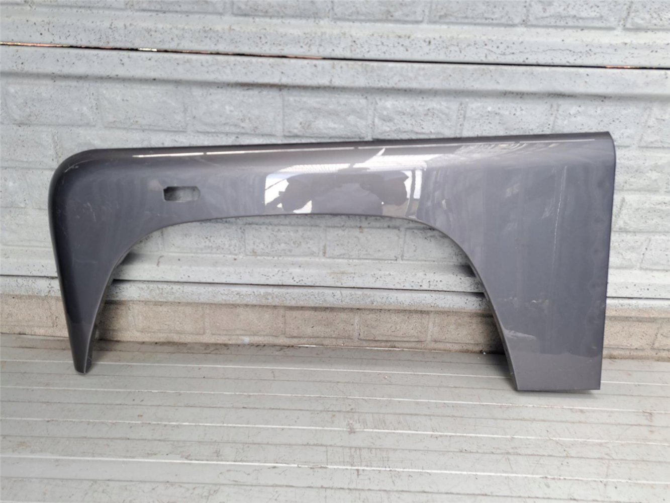 LAND ROVER DEFENDER 1 83- BŁOTNIK LEWY PRZEDNI ORYGINAŁ (17752543146)