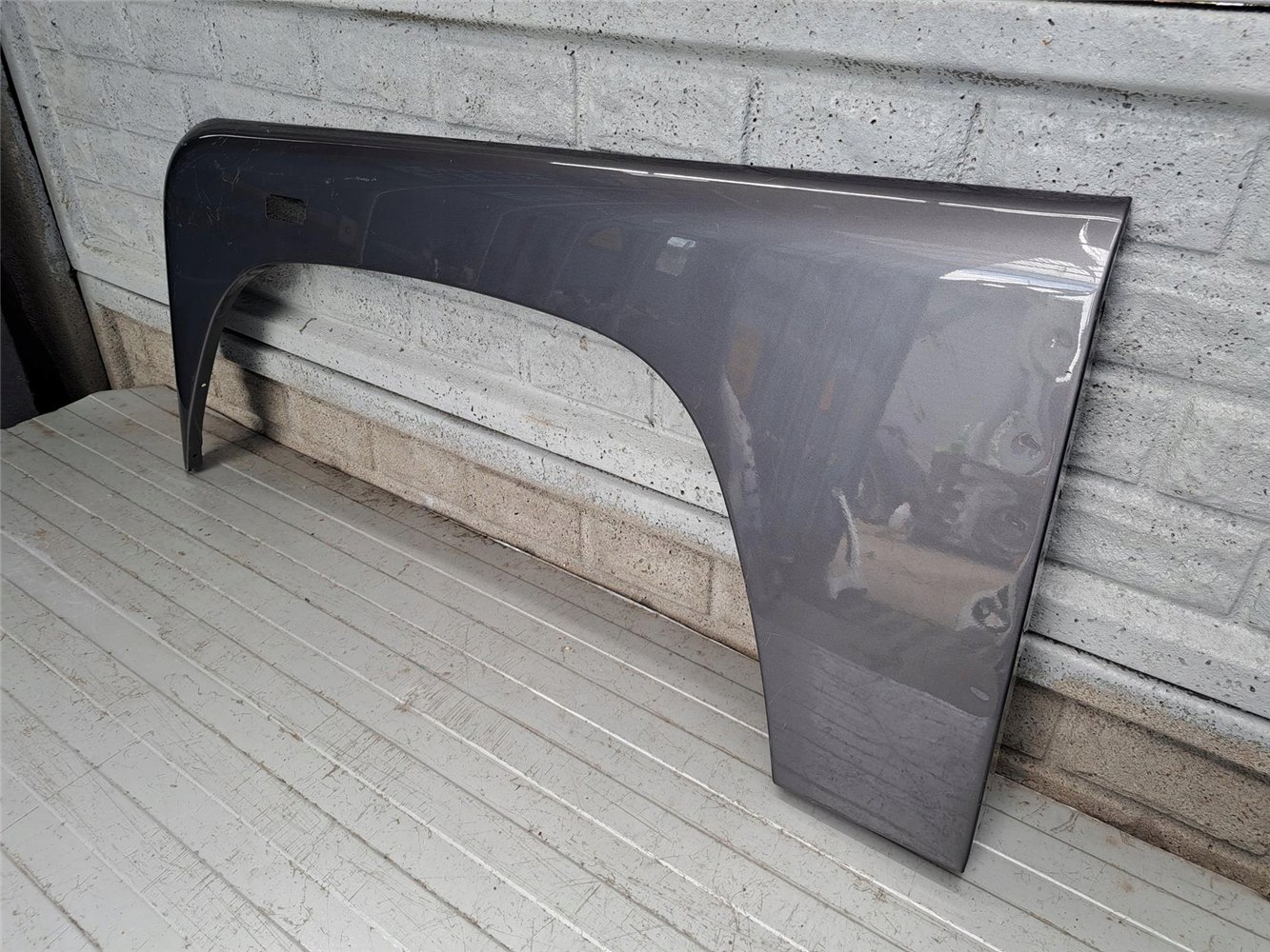 LAND ROVER DEFENDER 1 83- BŁOTNIK LEWY PRZEDNI ORYGINAŁ (17752543146)