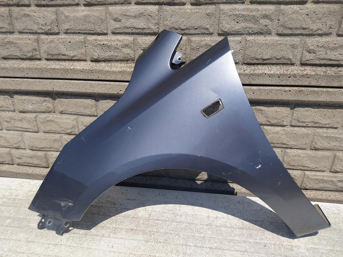 OPEL CORSA E 15-19 BŁOTNIK PRZEDNI LEWY - (12330176545)