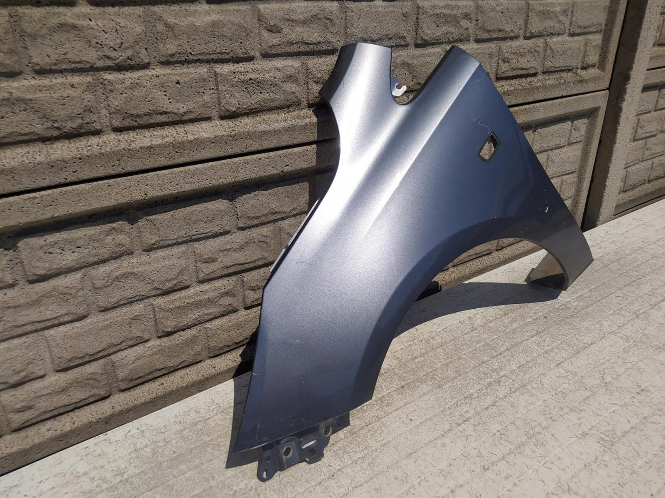 OPEL CORSA E 15-19 BŁOTNIK PRZEDNI LEWY - (12330176545)