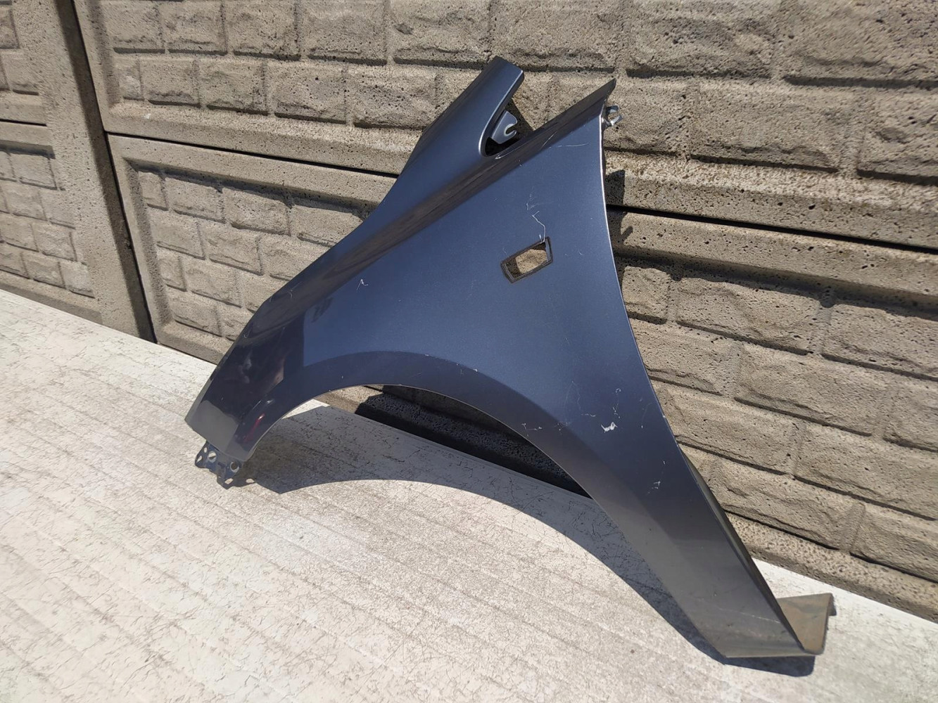 OPEL CORSA E 15-19 BŁOTNIK PRZEDNI LEWY - (12330176545)