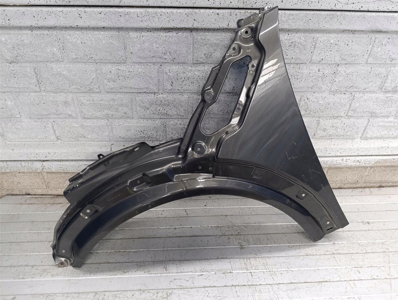 MINI COOPER COUNTRYMAN PACMAN R60 61 BŁOTNIK LEWY ORYGINAŁ (17770063105)