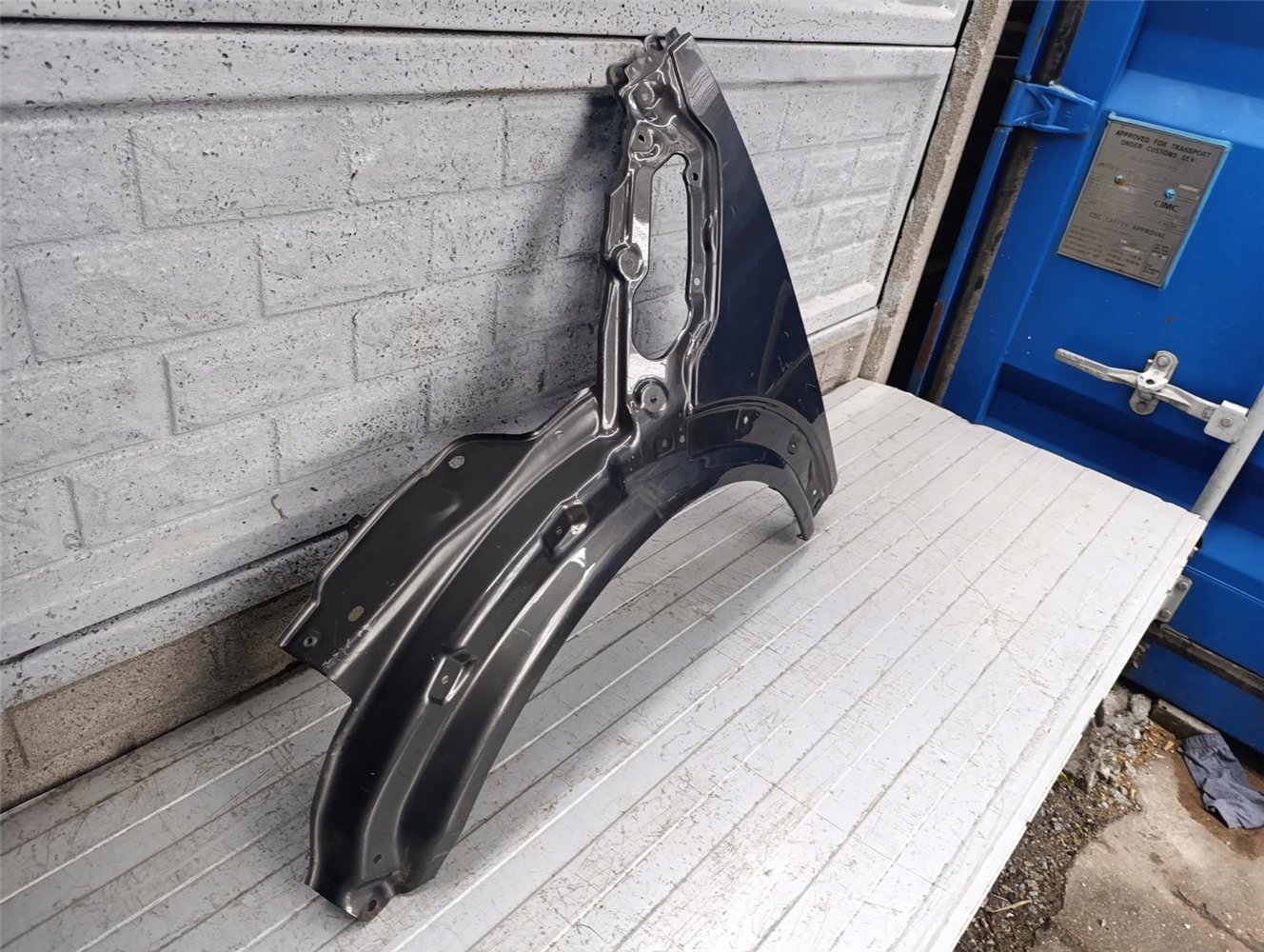 MINI COOPER COUNTRYMAN PACMAN R60 61 BŁOTNIK LEWY ORYGINAŁ (17770063105)