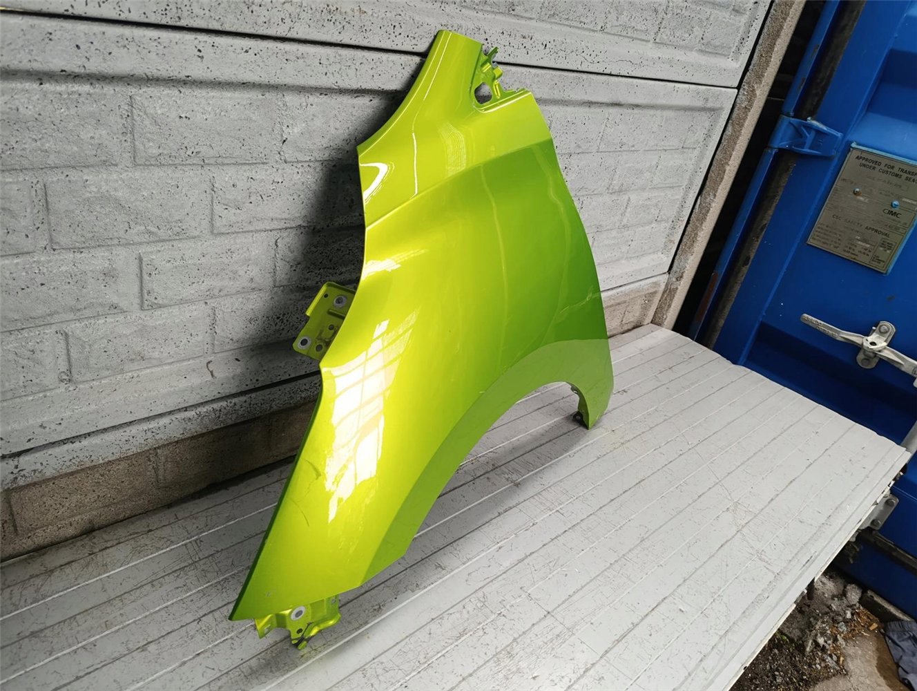 NISSAN MICRA K14 2017 - 2024 BŁOTNIK LEWY PRZEDNI ORYGINAŁ (17770067683)