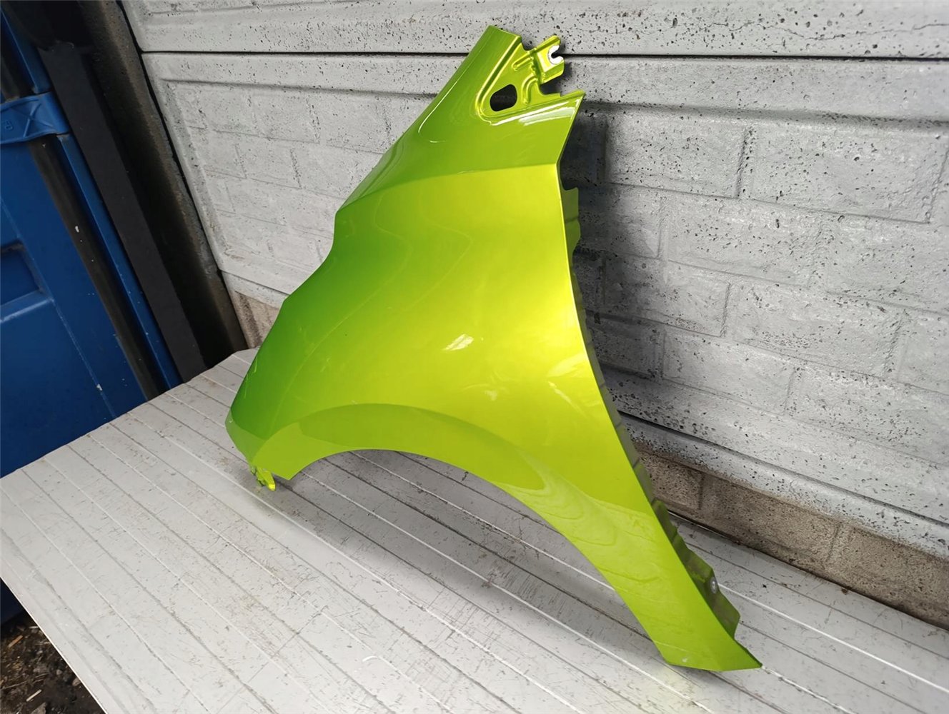 NISSAN MICRA K14 2017 - 2024 BŁOTNIK LEWY PRZEDNI ORYGINAŁ (17770067683)