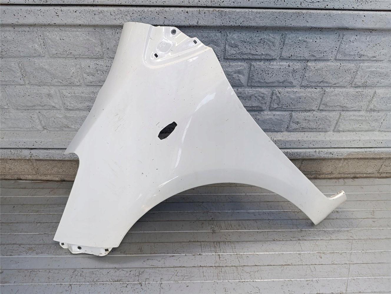 TOYOTA YARIS 2 II 05-12 BŁOTNIK LEWY PRZÓD ORYGINAŁ (17783448143)