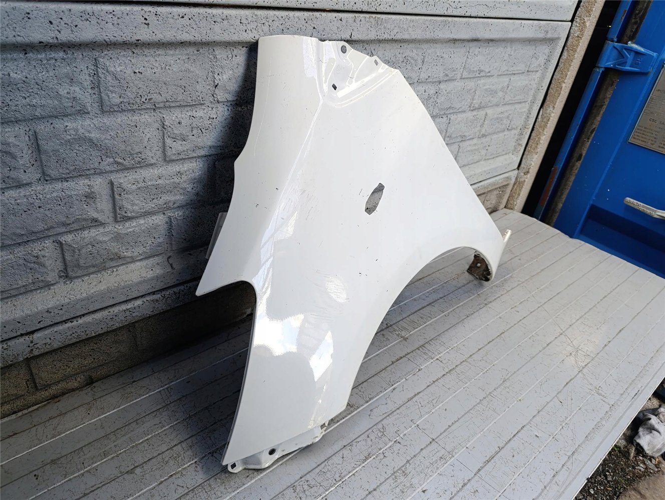 TOYOTA YARIS 2 II 05-12 BŁOTNIK LEWY PRZÓD ORYGINAŁ (17783448143)